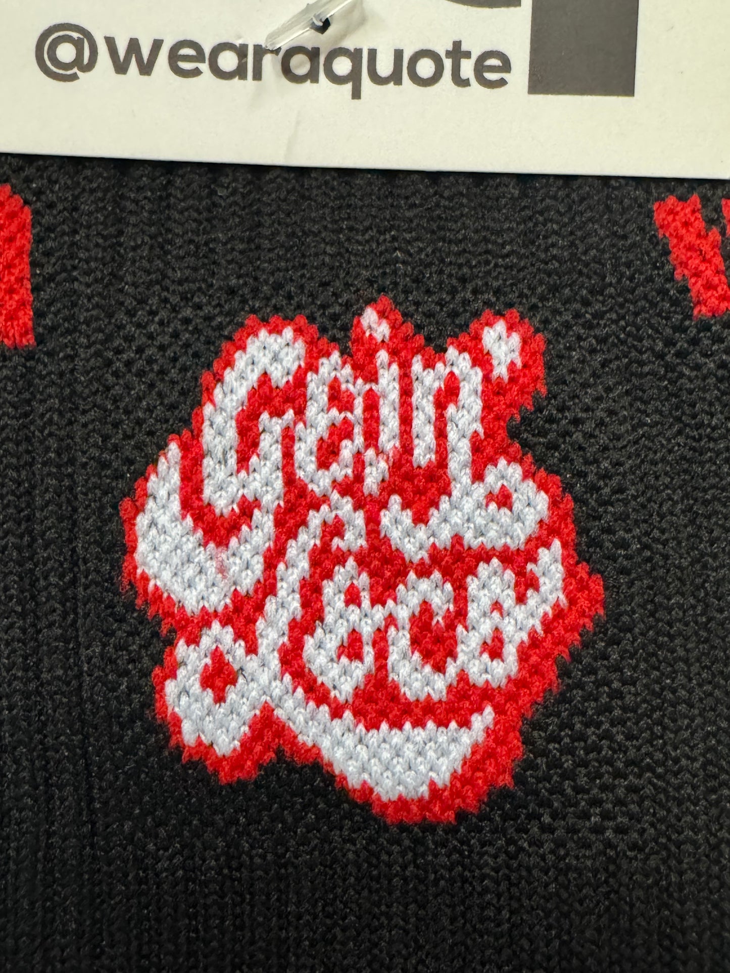 Goin Loco WAQ socks — red tube socks lifestyle shot