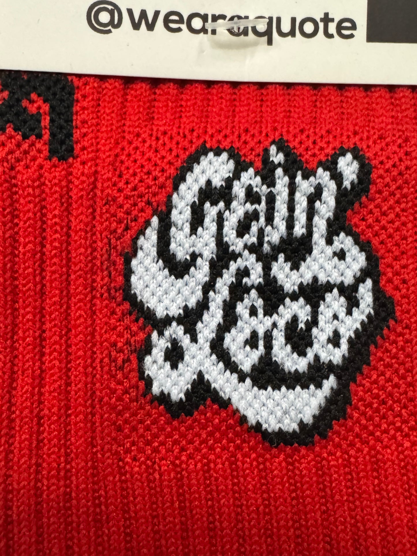 Goin Loco Wear a Quote socks — black crew socks detail