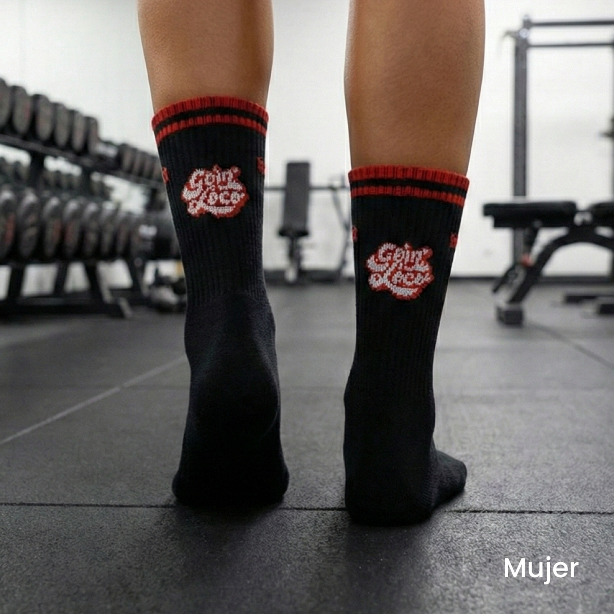 Goin Loco WAQ tube socks flat lay — black red gray athletic socks