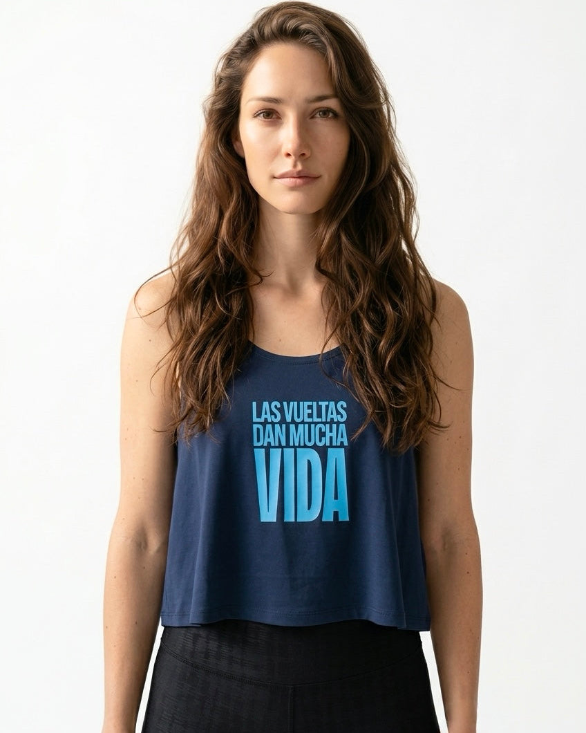 Las Vueltas dan Mucha Vida Cotica tank by Wear a Quote — navy crossback crop top front view