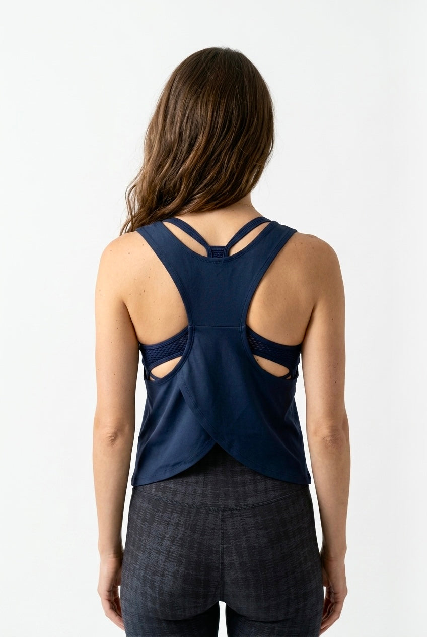 Wear a Quote Cotica tank top — crossback detail white athletic top back view