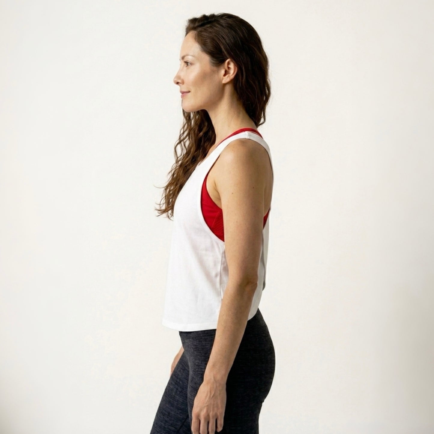 Quien Tiene Magia No Necesita Trucos Cotica — Wear a Quote crossback tank side view